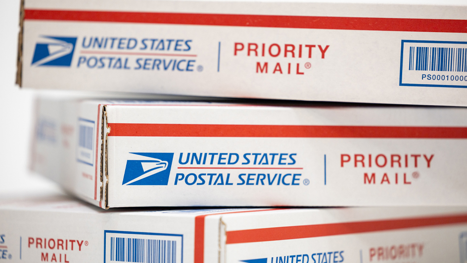 A stack of Priority Mail boxes