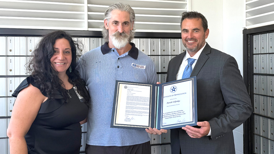 Three people standing side by side