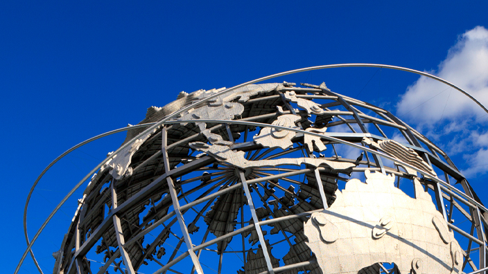 A 12-foot-tall, steel representation of the Earth with spouts of water shooting up from below