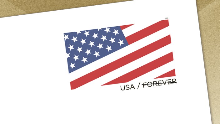 A white envelope with a partial, diagonal image of the U.S. flag in the top right corner