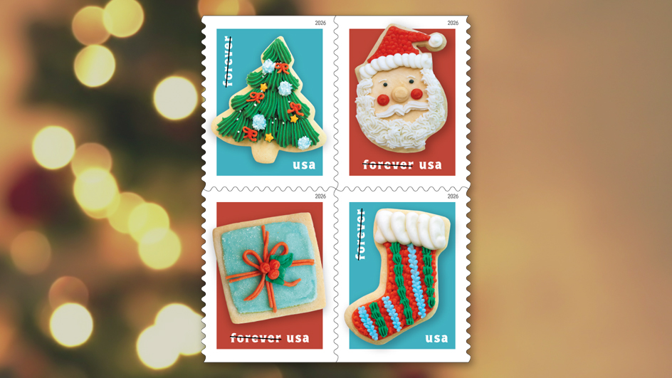 Four stamps with images of cookies in the shapes of a Christmas tree, Santa Claus, a wrapped present and a stocking