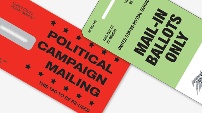 A red mail tag that reads “Political campaign mailing” next to a green mail tag that reads “Mail-in ballots only”