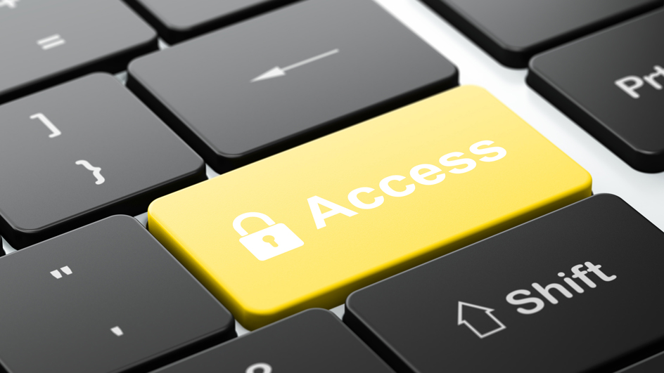 Computer keyboard with a yellow button labeled “Access” with a padlock icon